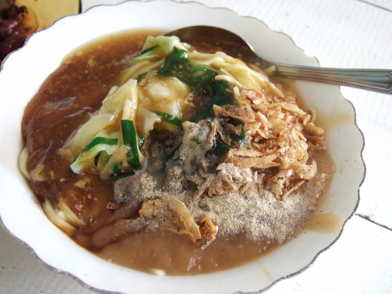 Semangkuk mi ongklok dengan kuah kental khas Wonosobo
